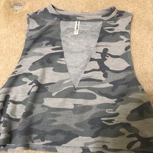 Muscle tee like tank top with triangle cutout